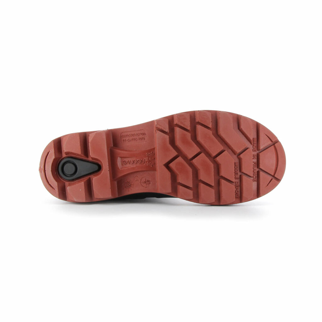 semelle de botte de couleur rouge avec un petit élément noir